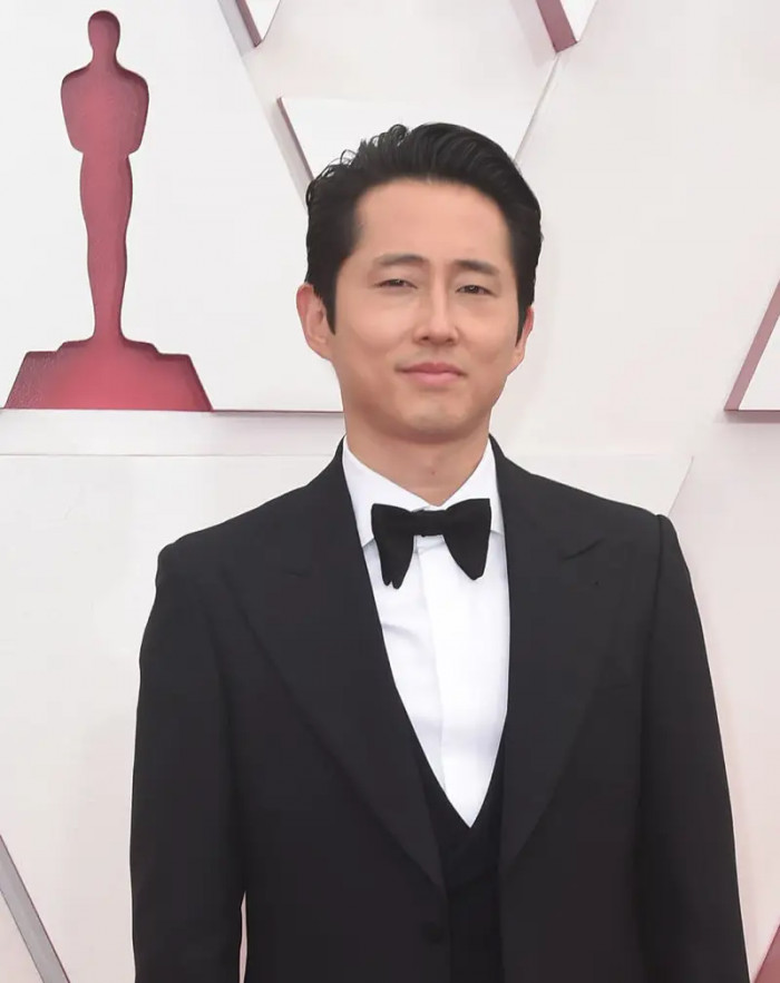 9. Here's Steven Yeun and he played roles in Minari, The Walking Dead, and Sorry to Bother You