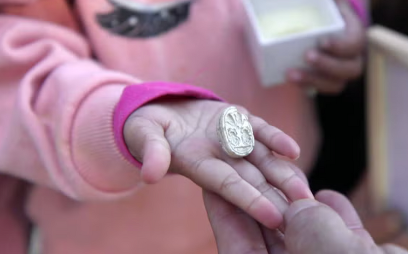 Family uncovers ancient artifact and reports discovery to authorities.