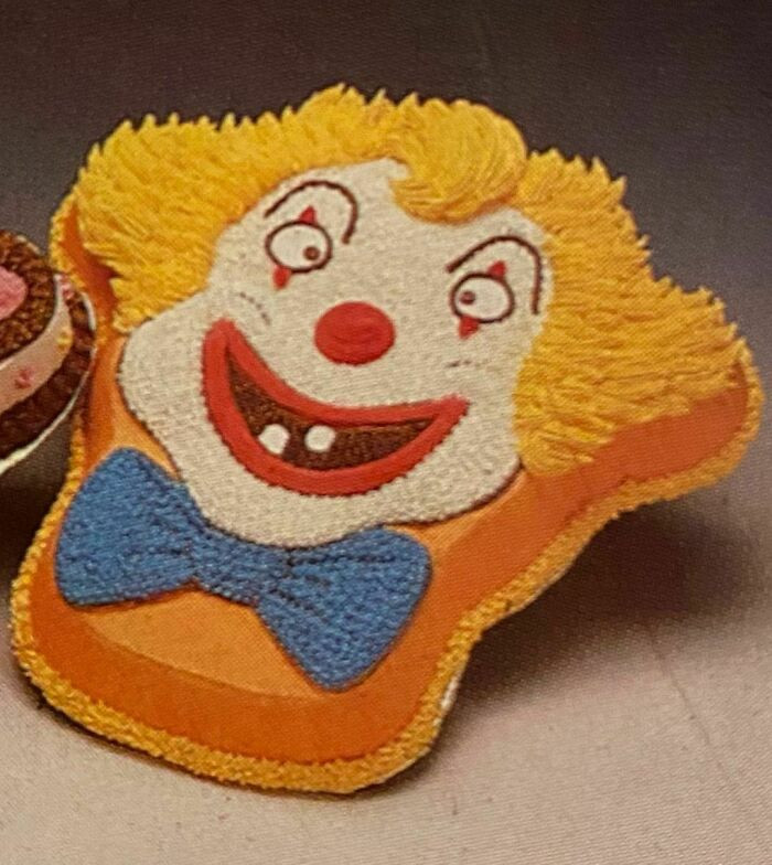31. Clown Cake featured in 1989 Wilton Yearbook Cake Decorating.