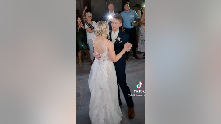 A guest attending a family reunion in a nearby ballroom sang for the couple in the basement.