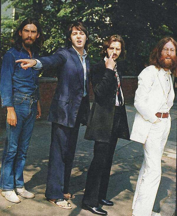 13. The Beatles before their iconic Abbey Road shot.