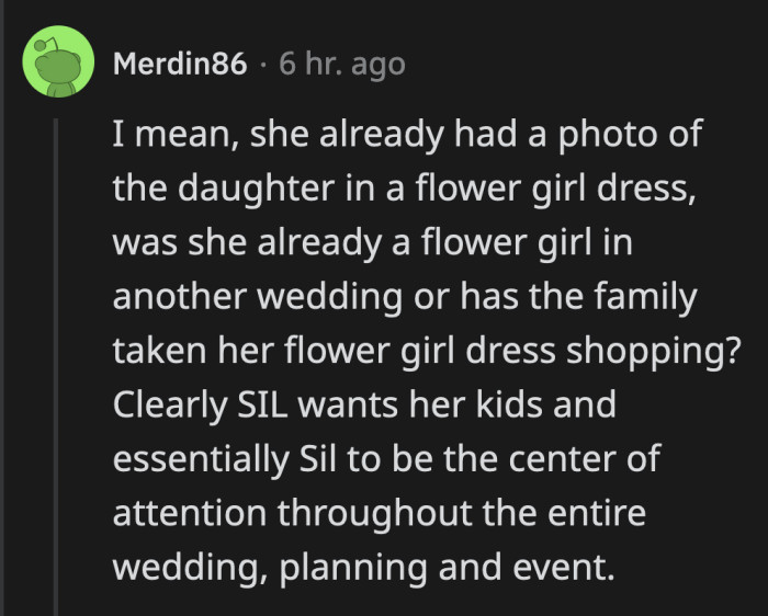 She sure had that photo ready. It probably means the twins have been in other weddings or they already shopped for their clothes.