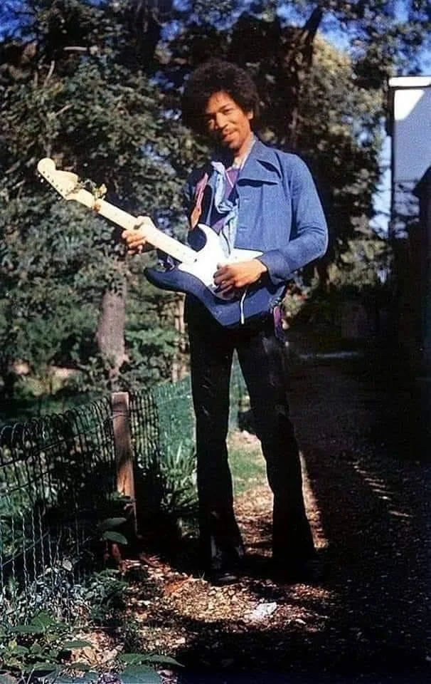 6. Jimi Hendrix's iconic pose with 