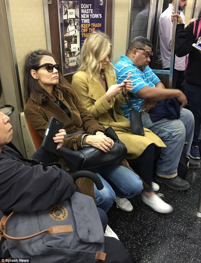 9. Katie Holmes sighted in a public transport