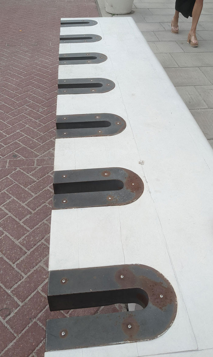 23. This park bench with weird cutouts.