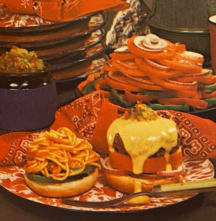 25. Golden Gate Saucy Burgers With Spaghetti Topping (Family Circle Illustrated Library Of Cooking Volume 3, 1972) - A classic recipe for saucy burgers topped with spaghetti from a vintage cookbook.