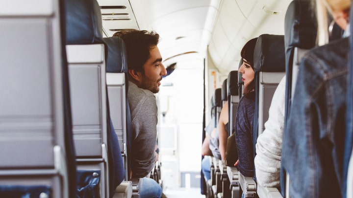 If you're anxious about flying, let the people you're with know. They can offer support and help you feel more at ease during the flight.