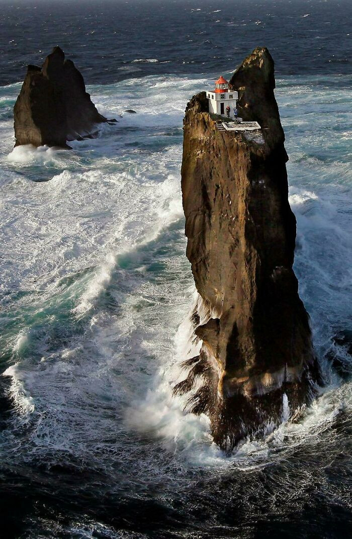 33. Lighthouse By The Coast Of Iceland