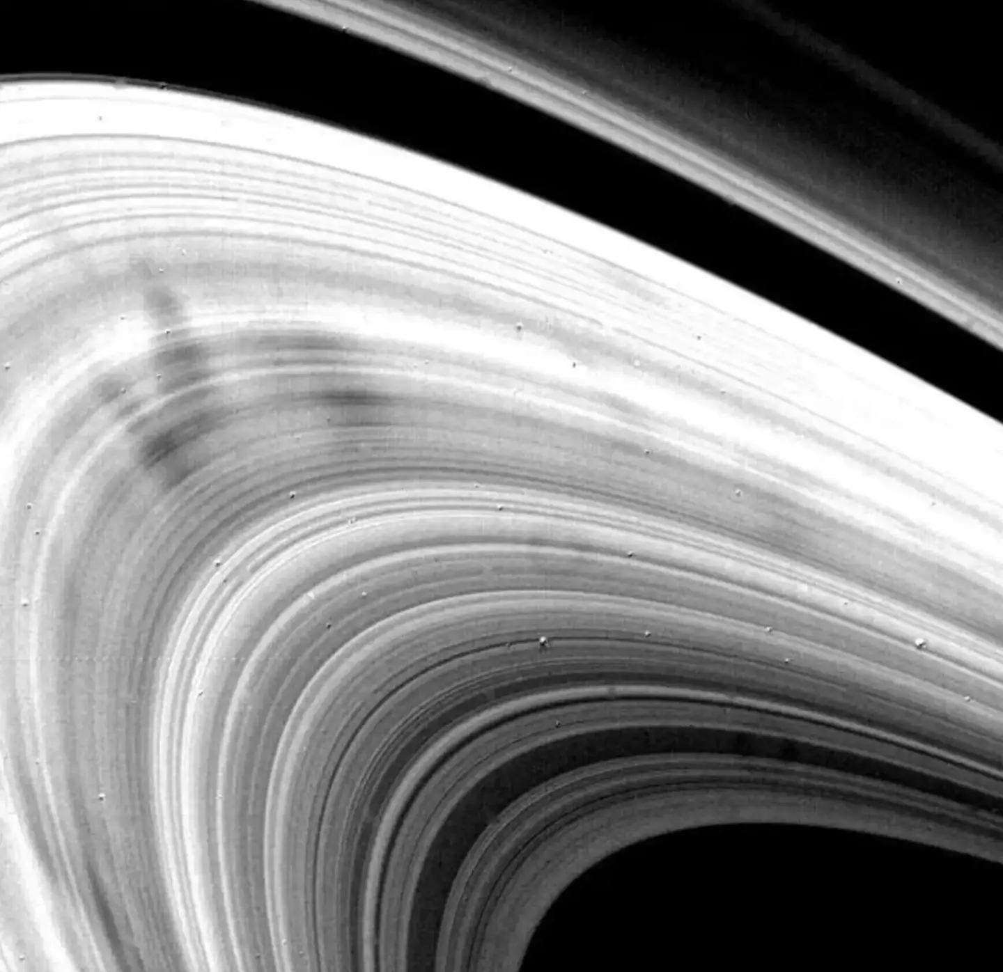 Adding to the mystery of Saturn’s rings is the appearance of strange smudges known as “spokes” that periodically show up on the rings.