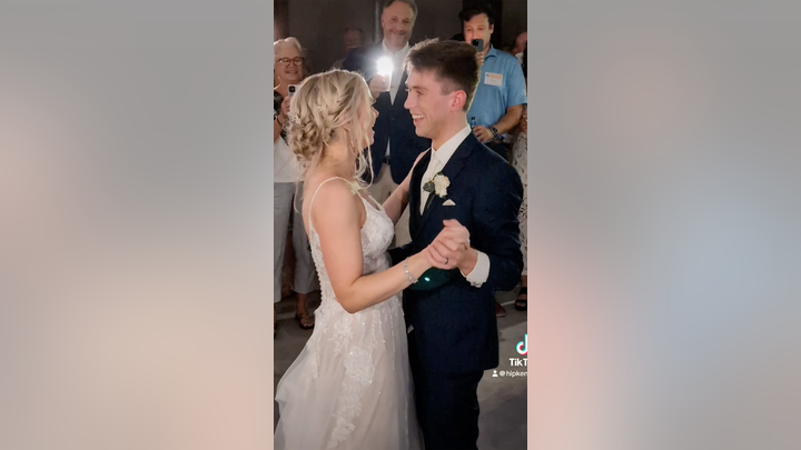 Sarah and Alex Schilke shared their first dance as a married couple in the basement of their wedding venue, finding a memorable moment amid a tornado warning.