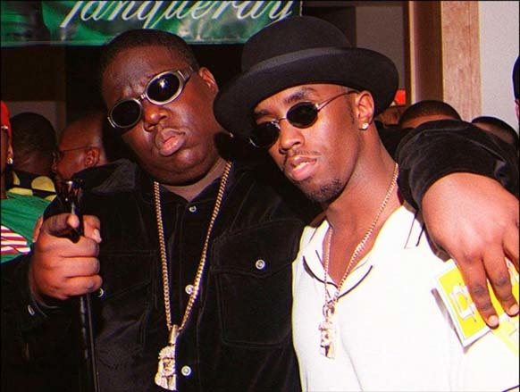 9. Biggie Smalls with Sean “P. Diddy” Combs right before his final moments after the Soul Train Music Awards.