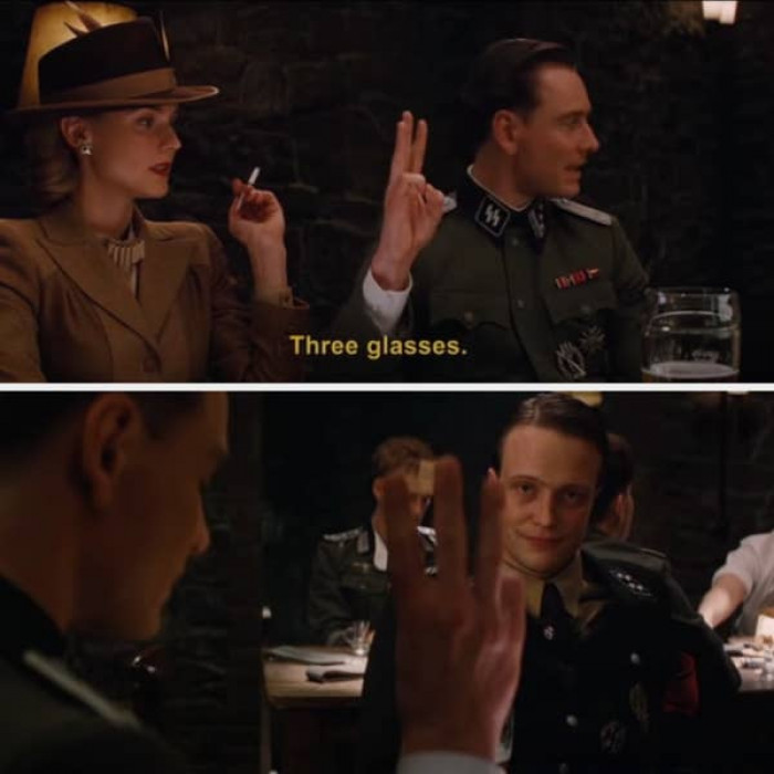 24. When Hicox makes a hand motion at the underground pub in Inglourious Basterds, he reveals himself: