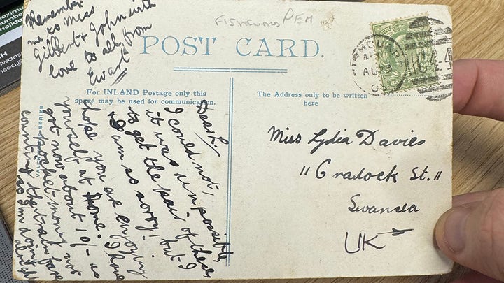 The postcard is from August 1903, making it 121 years old.