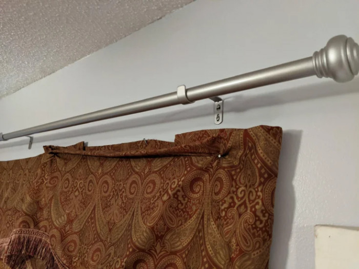 16. As a landlord, I am constantly amazed at some things my tenants do. I installed new curtain rods before the new tenant moved in, but she still felt it necessary to nail the curtains to the wall.