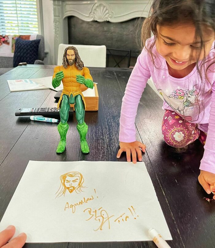 She is a huge fan and even ate her birthday breakfast with her Aquaman figurine by her side
