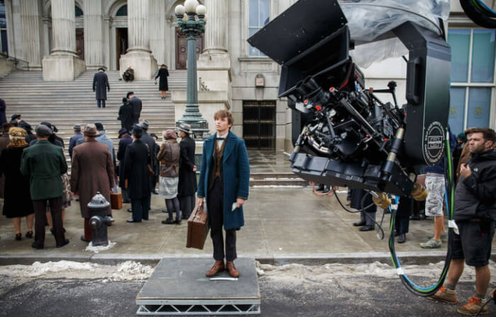 14. Eddie Redmayne had to place himself on a stand to create the illusion that he was taller than he actually is in real life. This was for Fantastic Beasts and Where to Find Them.