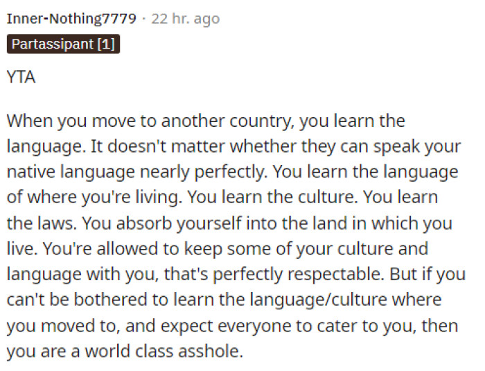 Here's another comment from someone telling her that she should be the one learning the native language of the country she's in.