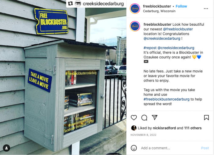 This box was created by the group FreeBlockBuster.org, which aims to provide free movies to people in the same way that free libraries distribute books.  The idea for these boxes came from a former Blockbuster worker who repurposed unused newspaper dispensers.