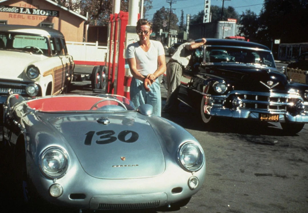 19. James Dean alongside his infamous haunted Porsche, 
