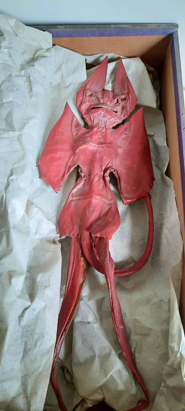 17. What Is This Red Leather Devil Figure, Found In A Wooden Box In An Attic?