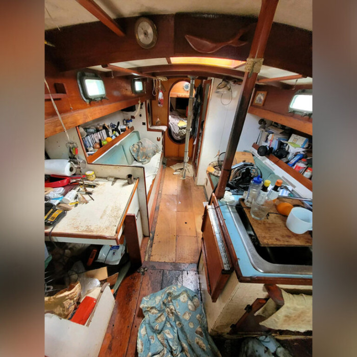 This is the small sailboat where a man lived with Jack the cat